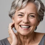 Smiling woman after dental treatment in Porto